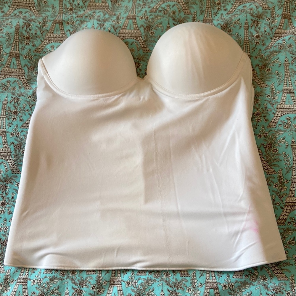 Strapless corset with boning and tummy control.